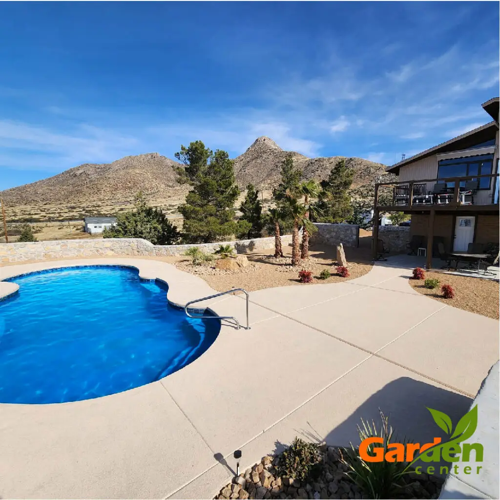 A newly installed pool is seen in a backyard. Meant to display to customers.